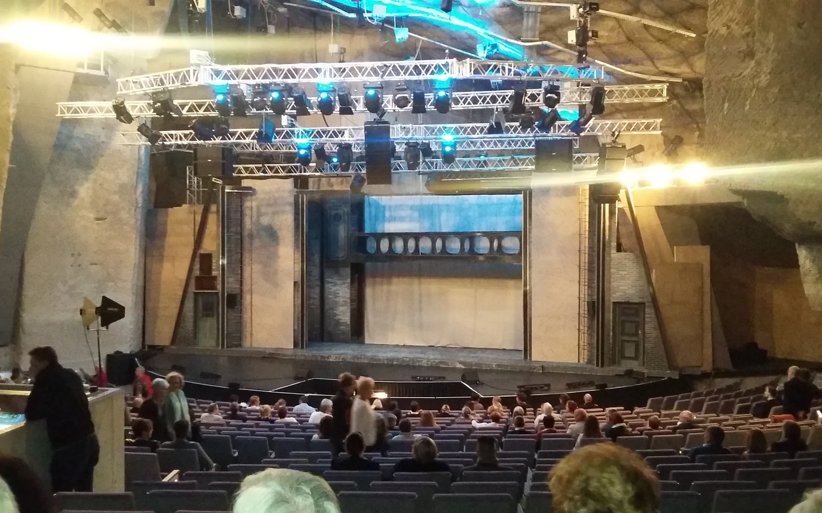 Stage and stone walls inside the Cave Theatre at Fertorakos