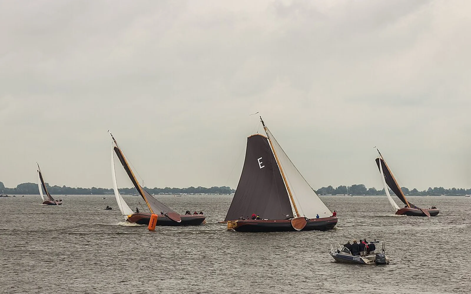 Traditional skûtsjes sailing on the Sneekermeer in Friesland