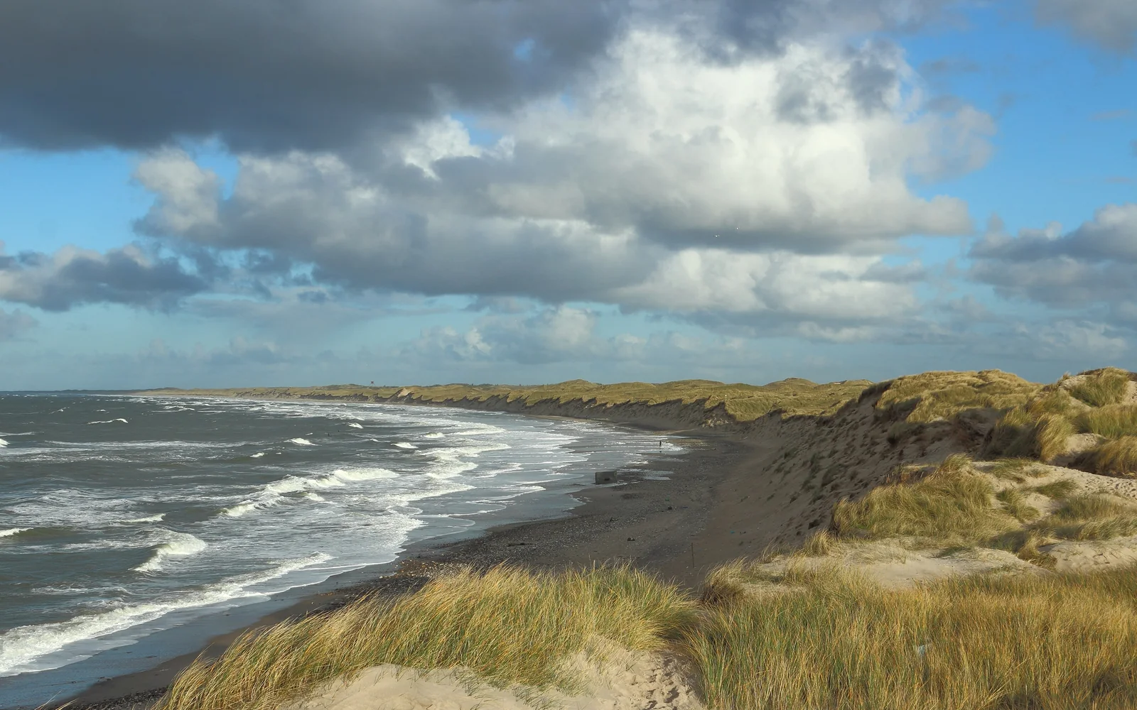 Dunes and rough North Sea water at Nørre Vorupør
