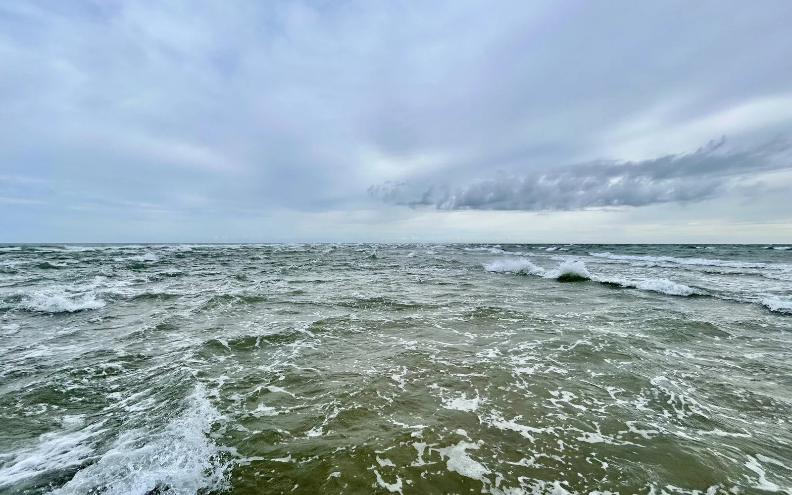 Waves meeting on the sandy tip of Grenen near Skagen