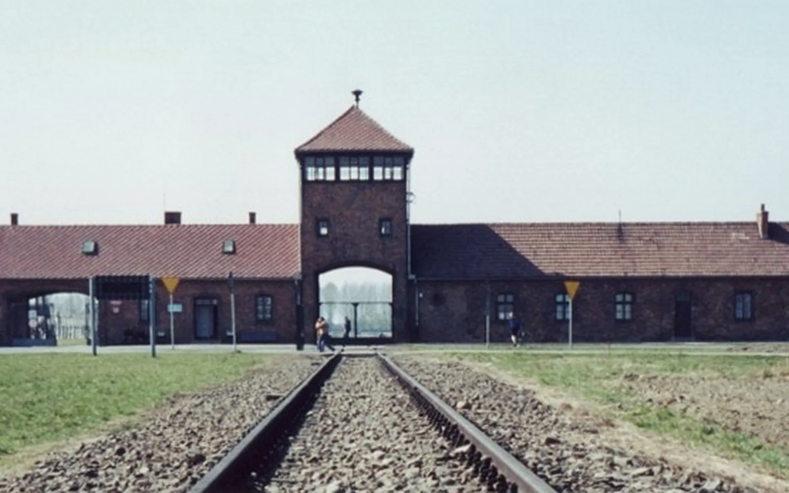 Historic gate and railway approach at Auschwitz II-Birkenau