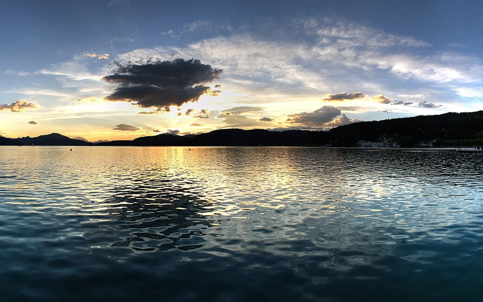 Lake Wörthersee and its wooded shoreline