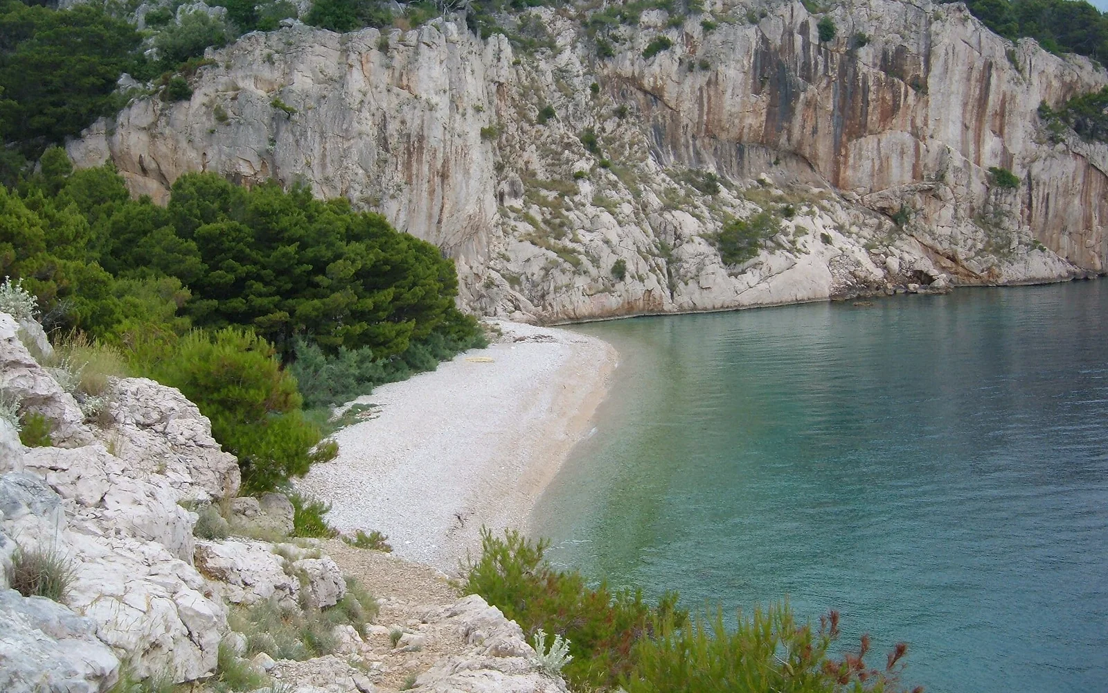 Nugal beach below cliffs near Makarska