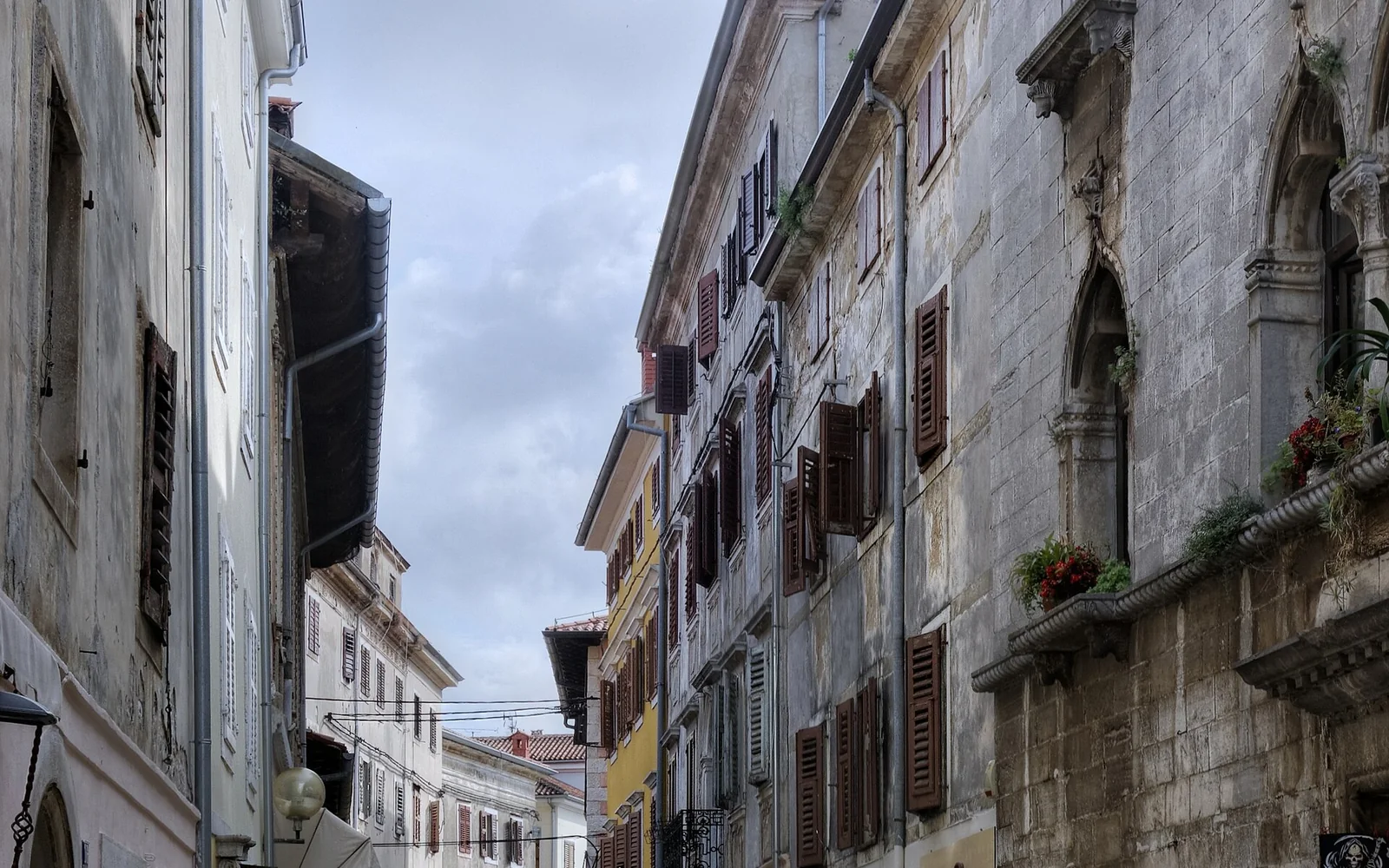 Stone buildings along Decumanus Street in Poreč