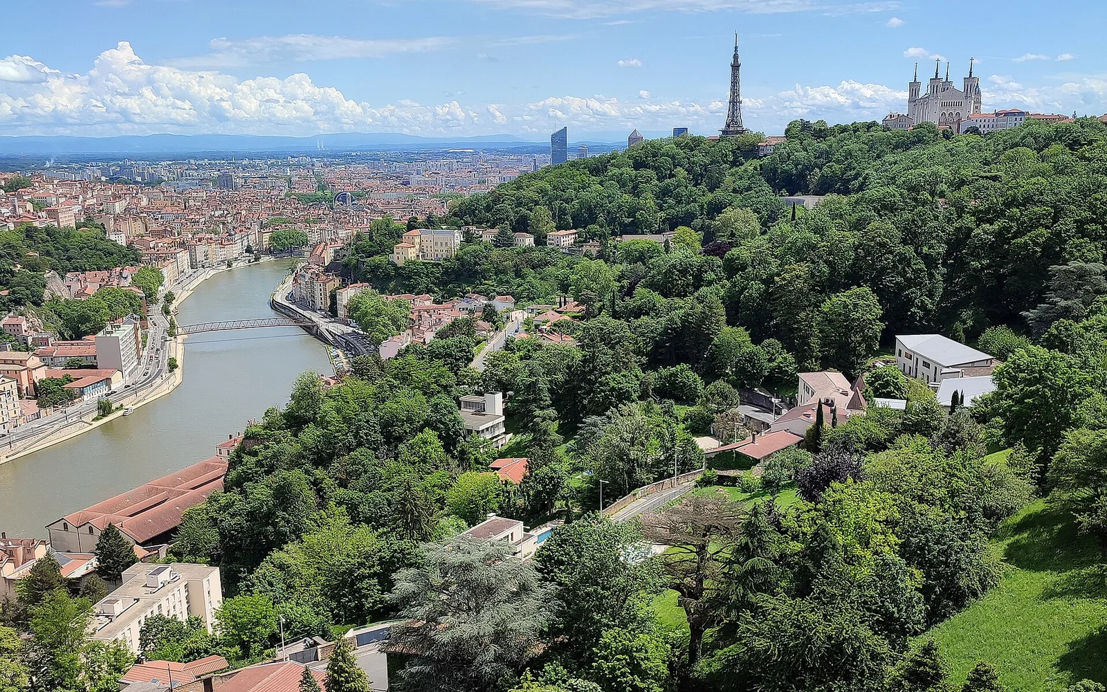 The Saône entering central Lyon with Fourvière above the river