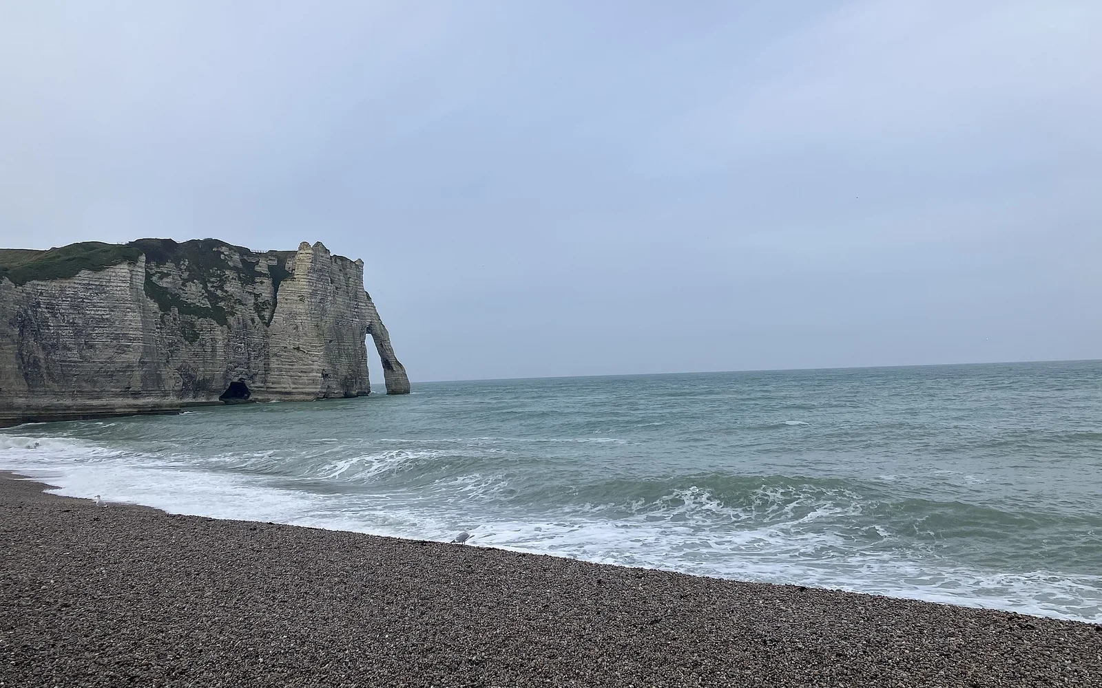 The white cliffs and sea arch at Étretat in Normandy