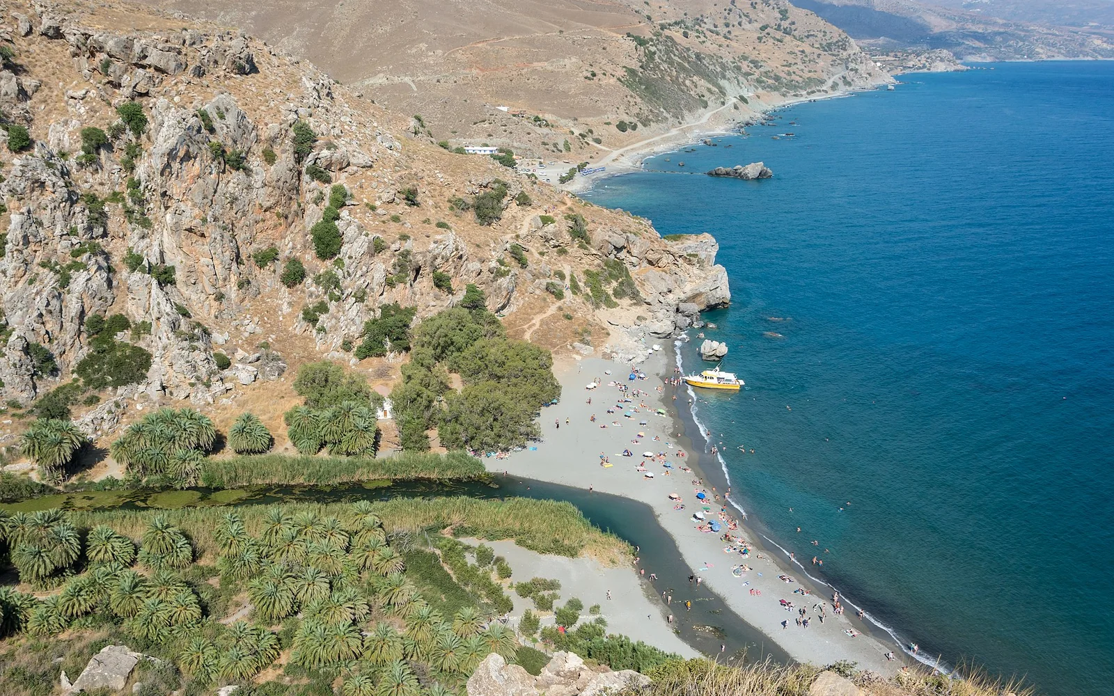 The palm-lined river and coast at Preveli in Crete