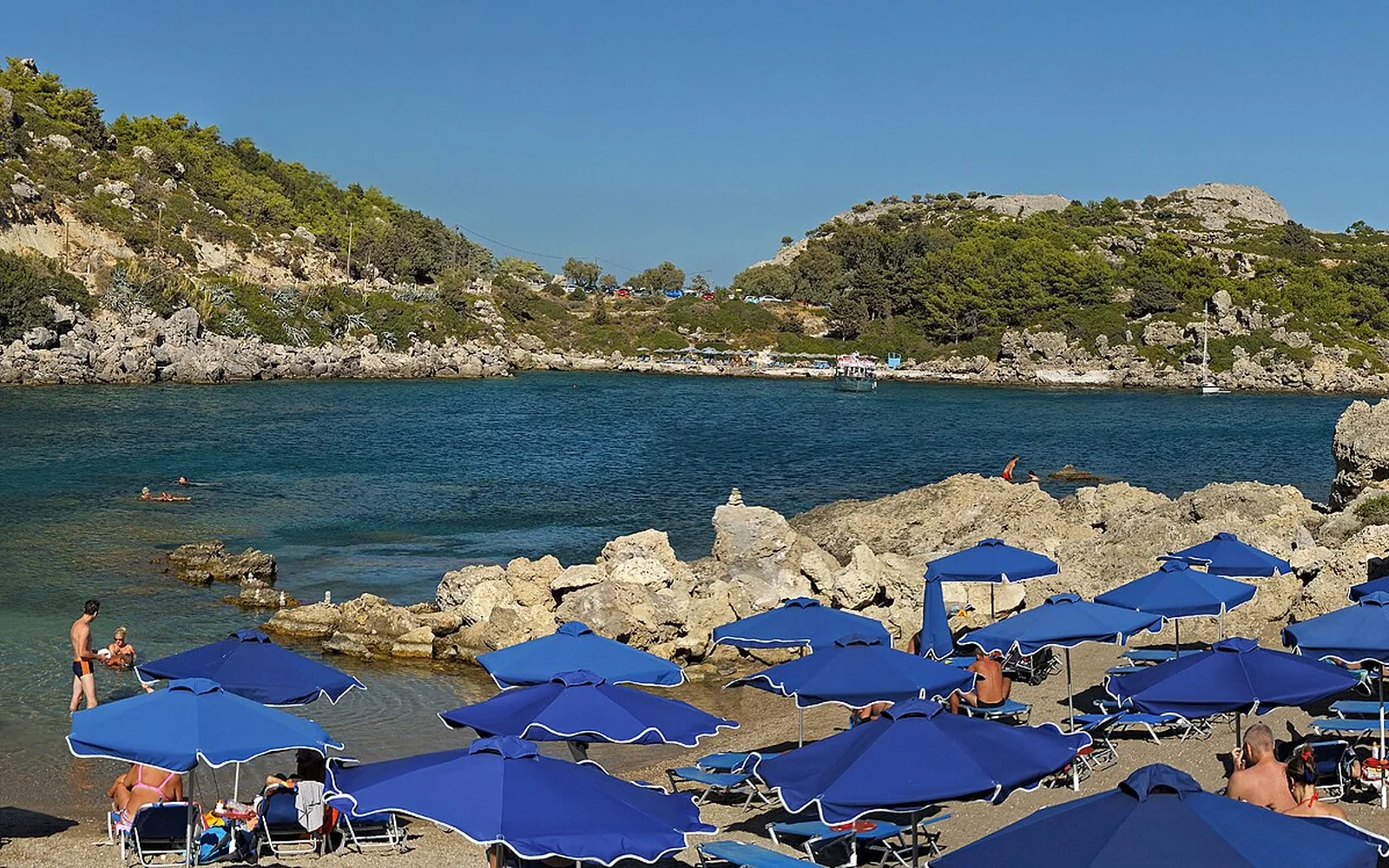 The rocky coast and clear water at Ladiko on Rhodes
