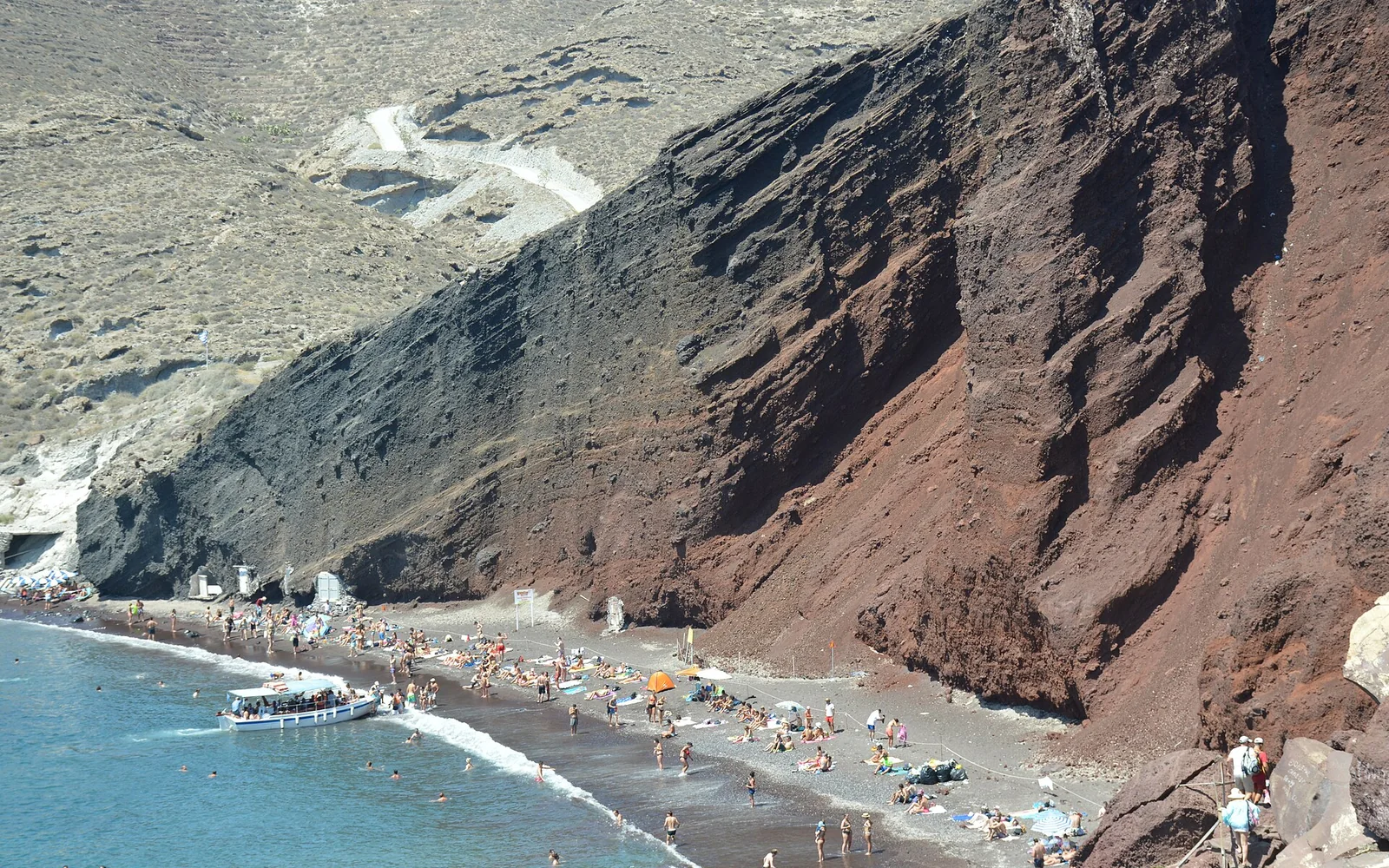 Red volcanic cliffs and shore near Akrotiri