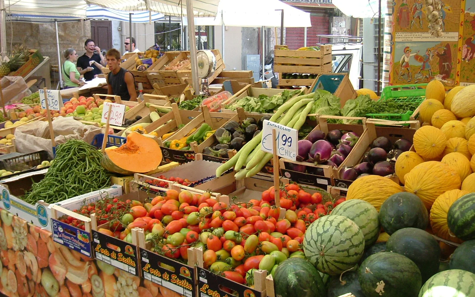 Stalls and shoppers in Palermo's Ballarò market