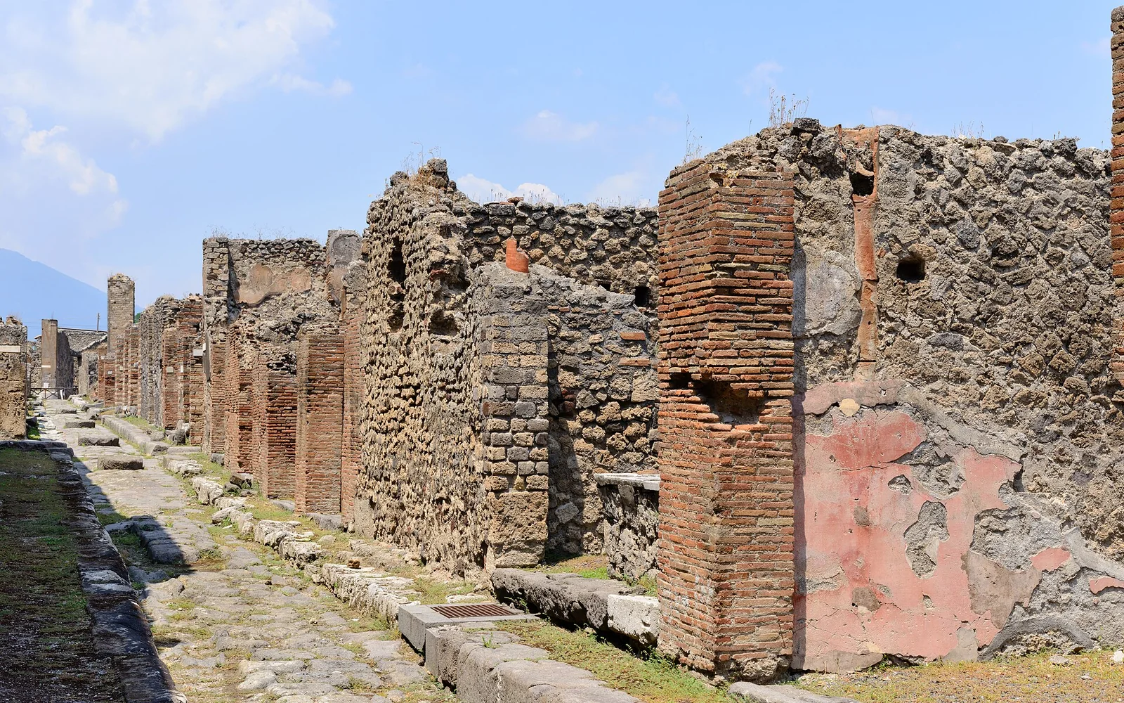 Stone-paved street within the Pompeii archaeological site