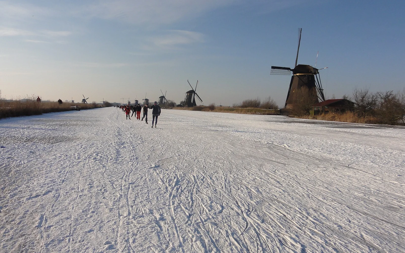 A windmill and canal in the Kinderdijk landscape