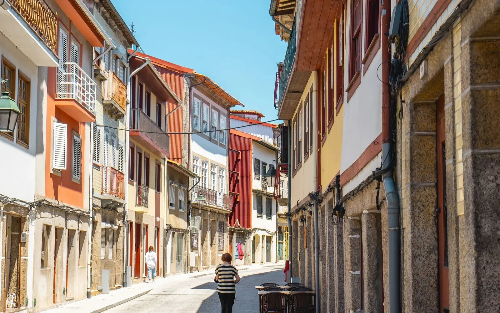 Traditional buildings on a narrow street in Guimarães old town