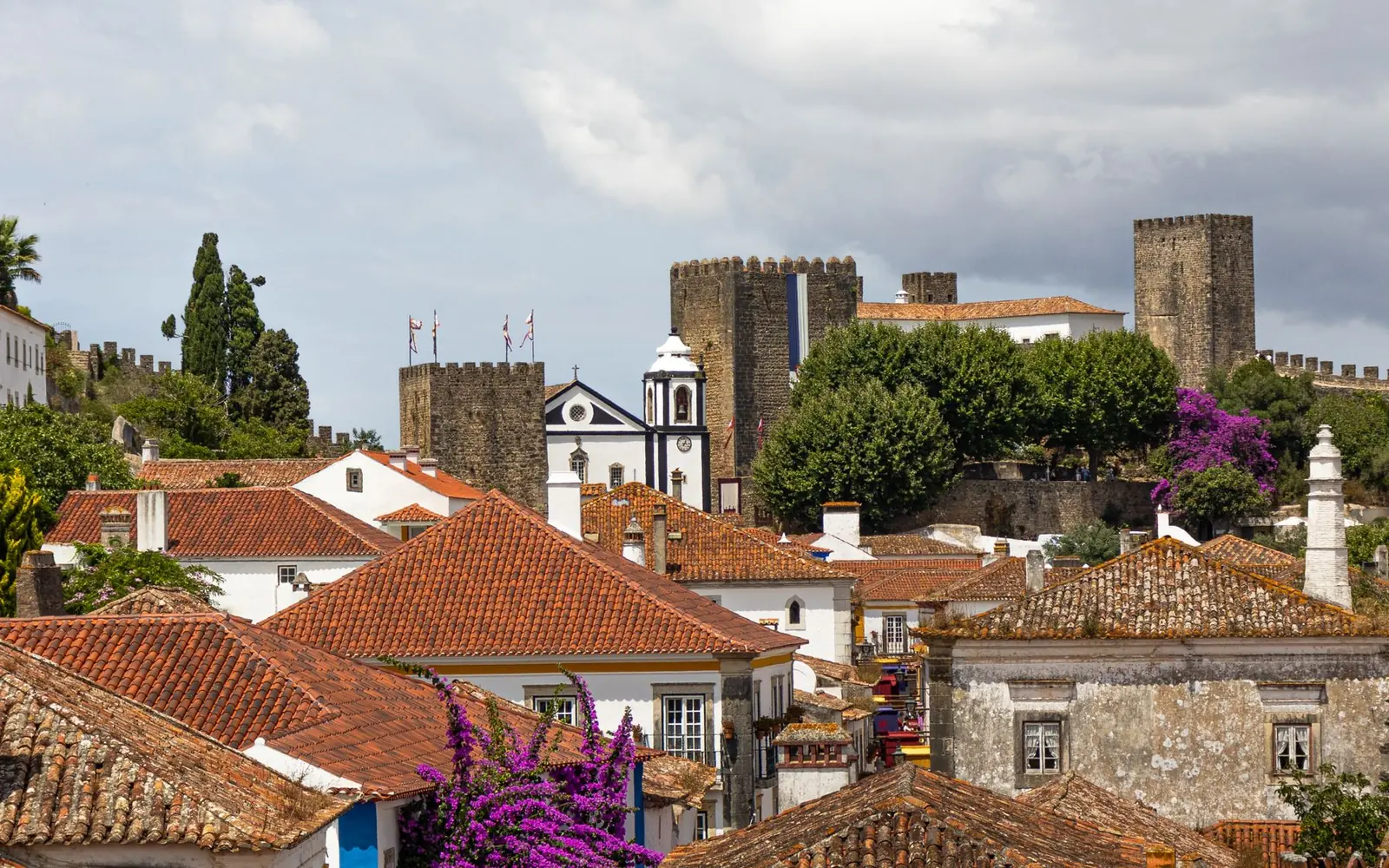 Óbidos rooftops, white houses and castle walls