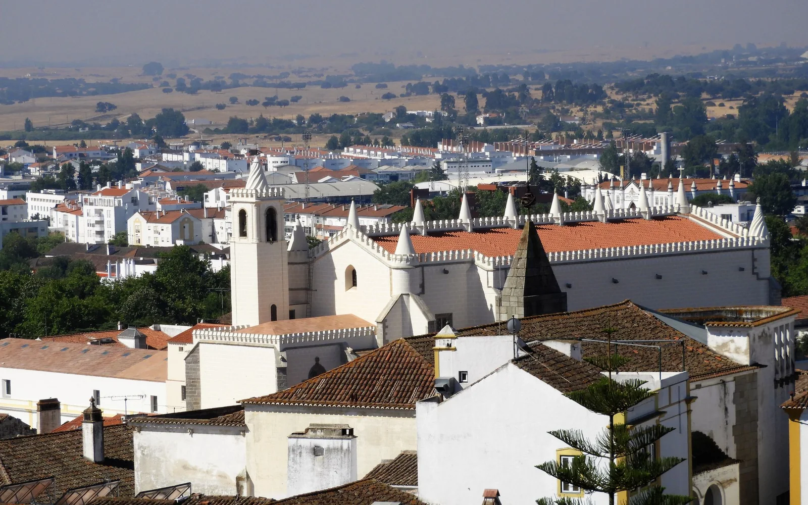 Évora rooftops and the open Alentejo countryside