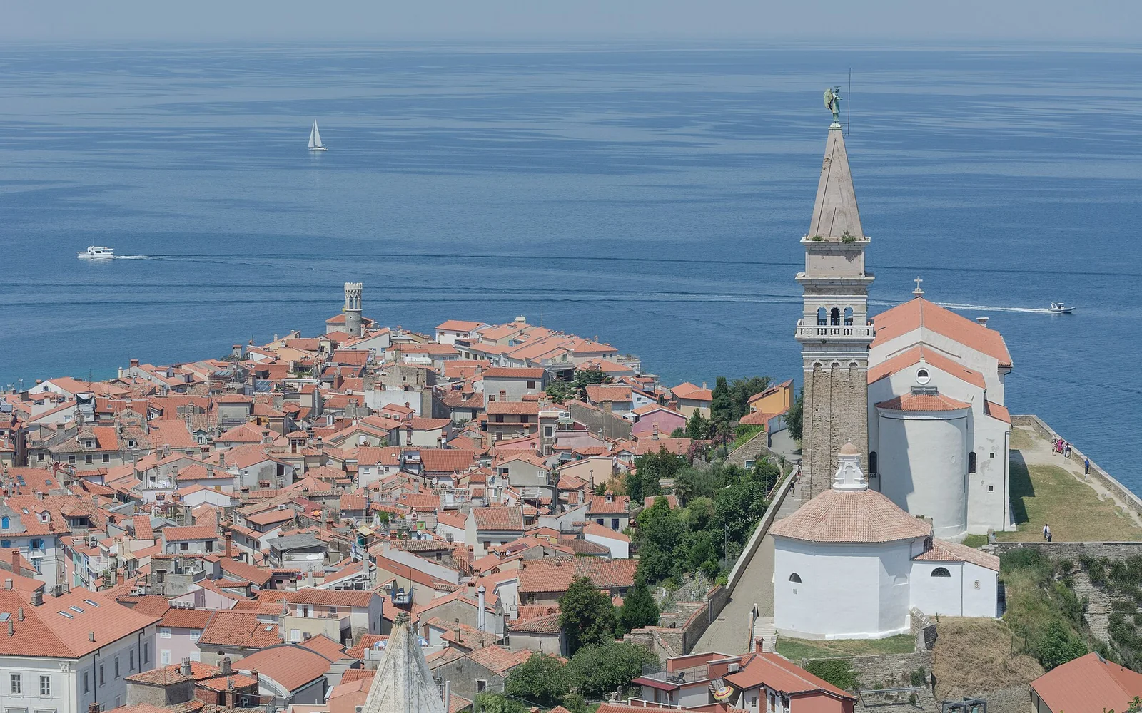 Piran old town extending into the Adriatic