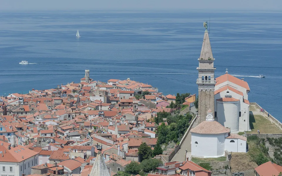 Piran old town extending into the Adriatic