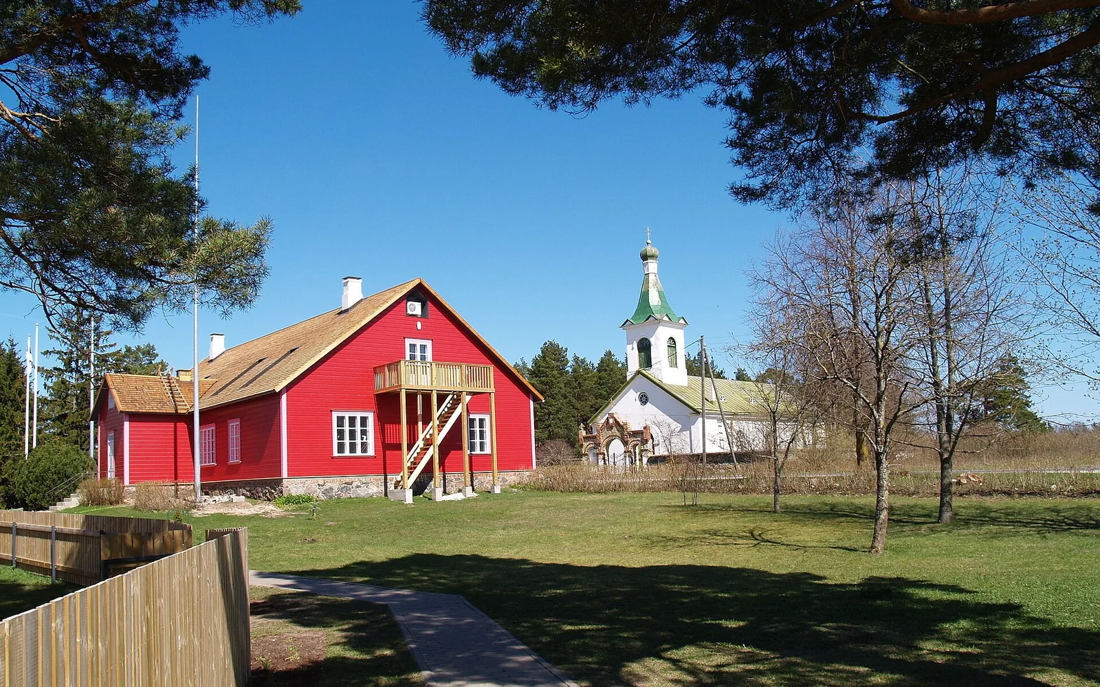 Kihnu Museum and church among trees on Kihnu Island