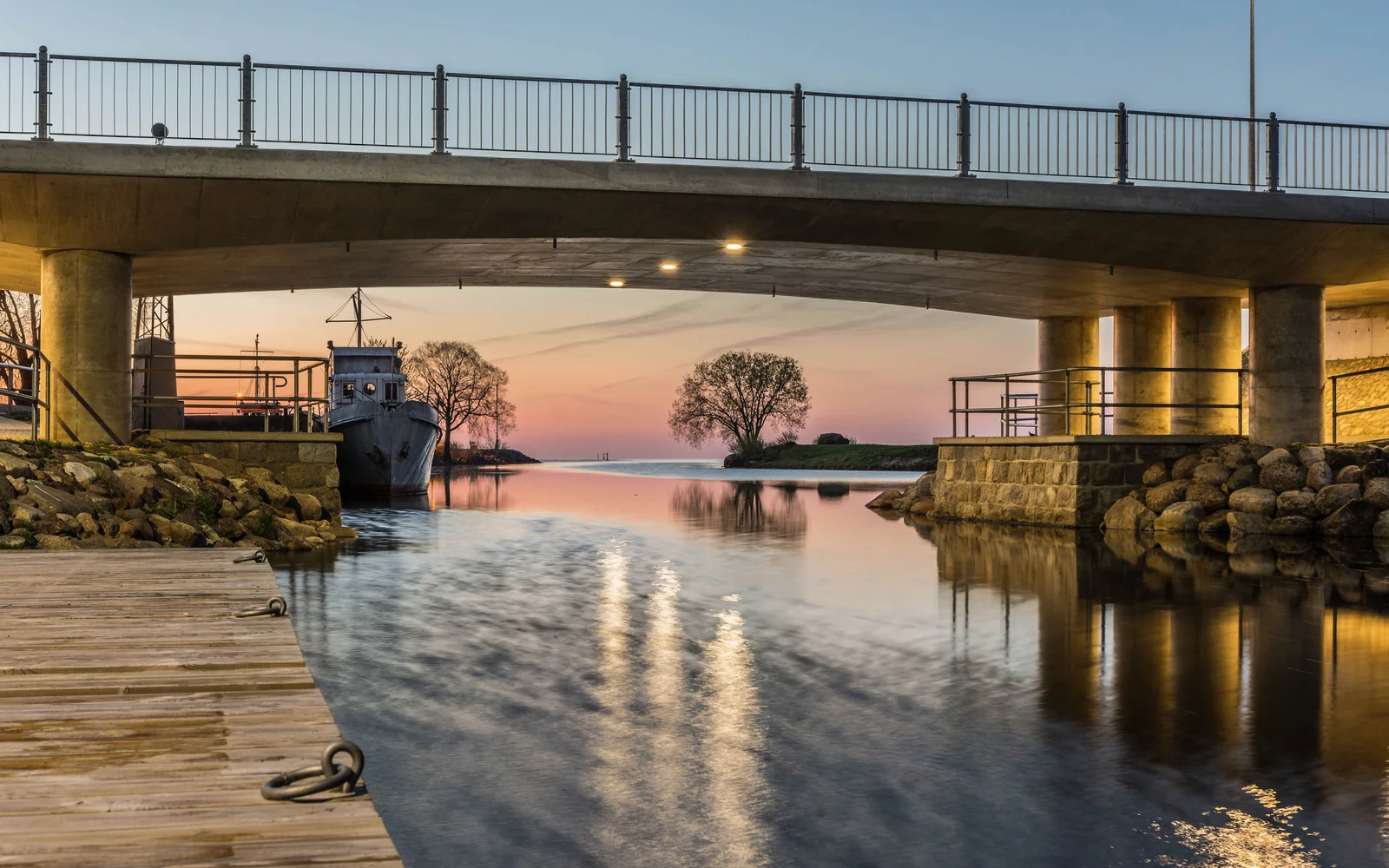 Sunrise beneath the bridge at Mustvee harbour on Lake Peipus