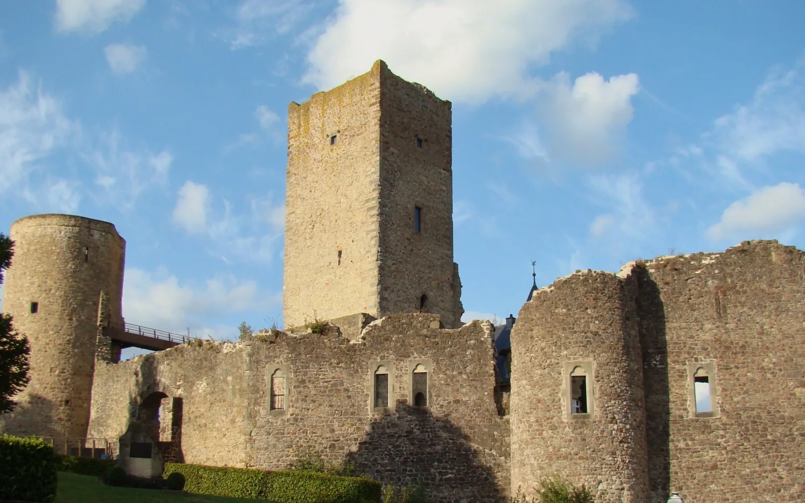 Stone keep and walls of Useldange Castle in Guttland